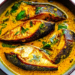 Shorshe Ilish: Hilsa cooked in a mustard sauce